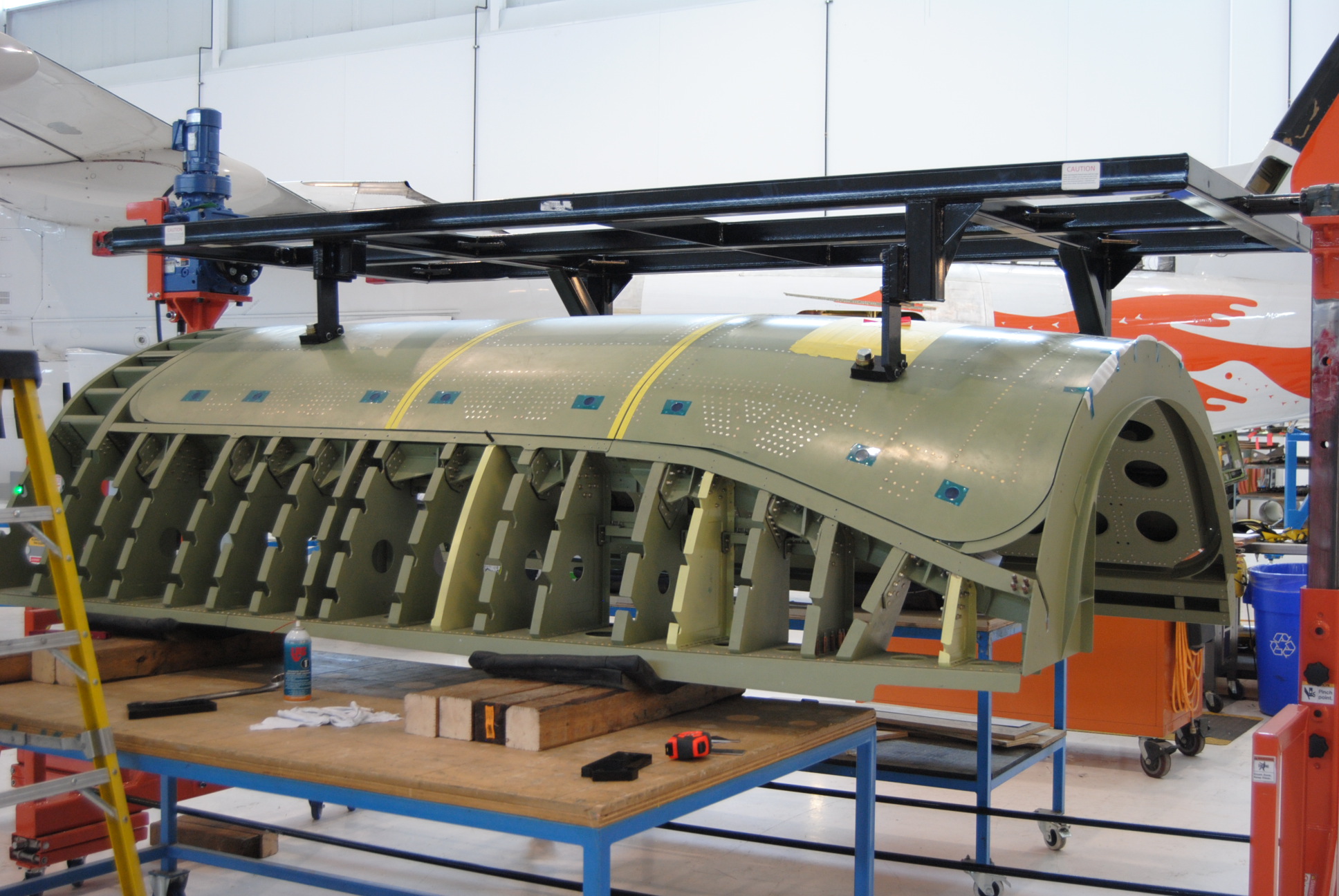 Air Inuit creates and installs the first cargo door on a Dash 8300